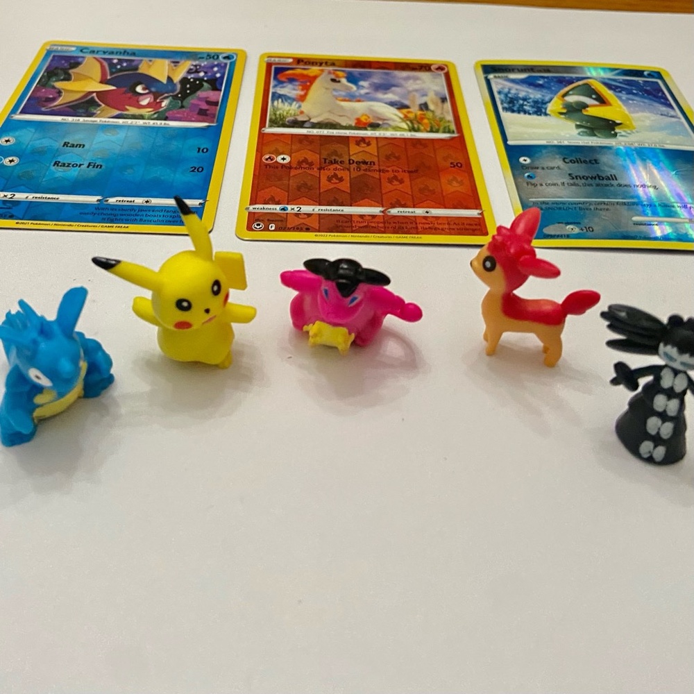 Lot (B): 3 Pokemon Reverse Holo Cards and 5 Pokemon Figures